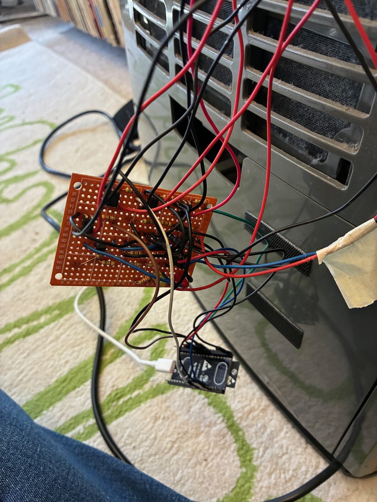 The perfboard interface with dividers, wired to the ESP32